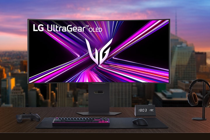 LG UltraGear OLED monitor setup on a gaming desk in a modern room.	