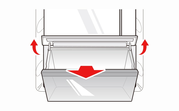 Lift the vegetable drawer up and remove it by pulling it out