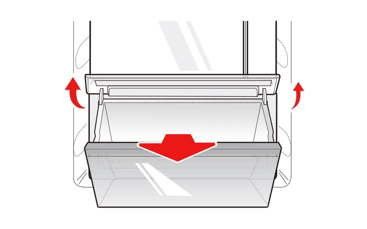 Lift the vegetable drawer up and remove it by pulling it out