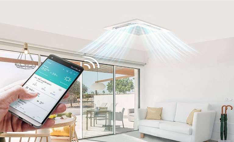 An image of someone operating an air conditioner on the ceiling, with a smartphone.