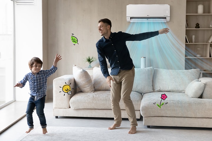 The air conditioner is activated behind the joyful father and son, and there are light bulbs and leaves that express energy around them.
