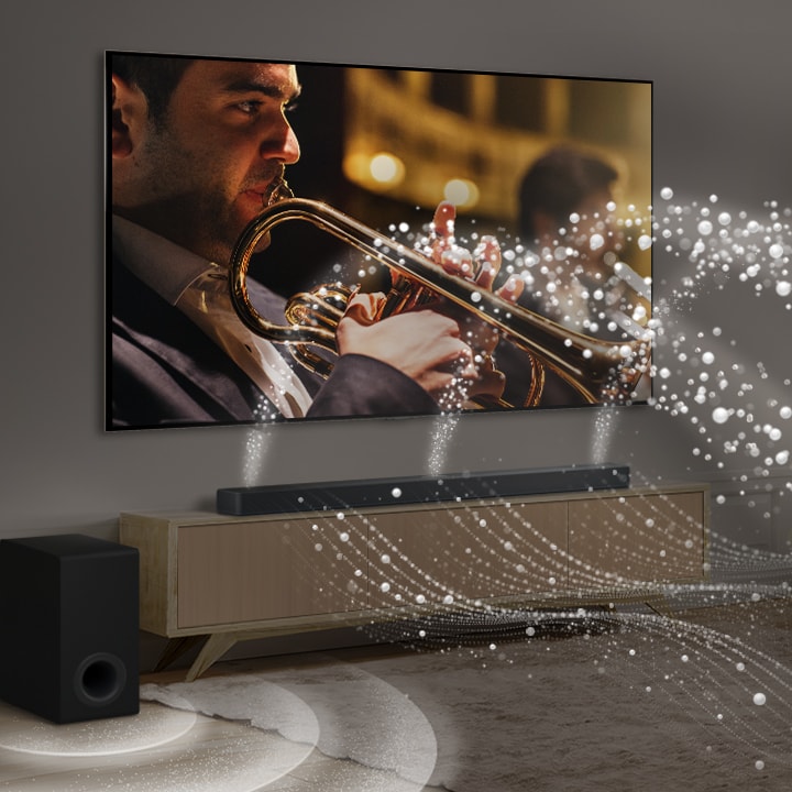 LG Soundbar, LG TV, and a subwoofer are placed in a modern city apartment. LG Soundbar is emitting soundwaves made of white droplets filling the room and a subwoofer is creating a sound effect from the bottom. As a whole, they are creating a dome effect across the room.