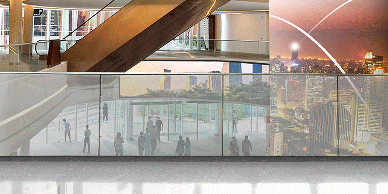 The 14mm LG Transparent LED film is installed in the shopping mall with reflecting the object behind the product even after the product is attached and turned off.