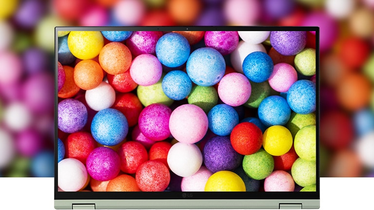 It shows the DCI-P3 99% (Typ.) wide color gamut with vivid and colorful balls on the screen.