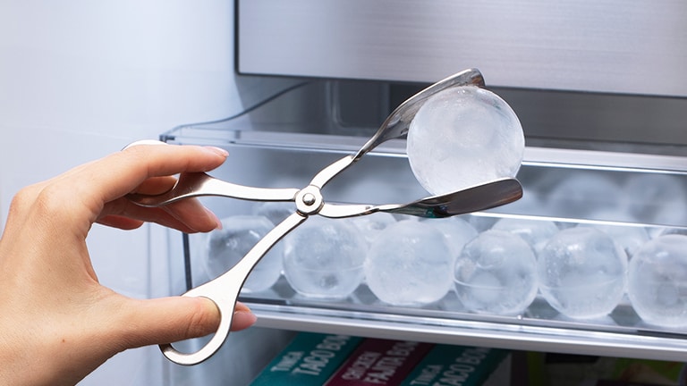 Image of taking ice out of the product