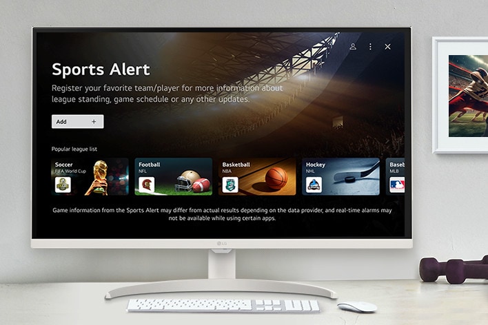 The smart monitor screen placed on the table displays the SPORTS APP screen.