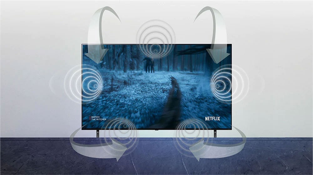 An epic battle plays out on screen. Arrows show sound flowing from the TV coming from multiple directions and sources.