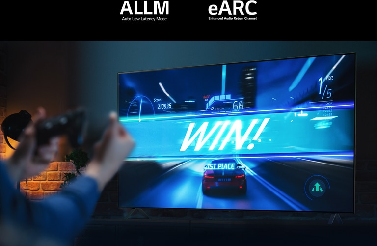 An image of a person using a controller to play a racing game on LG OLED A3.