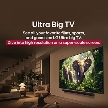 A girl and a dog are seated in front of a LG QNED TV mounted on a wall depicting three elephants walking outwards above a LG Soundbar. The title talks about how every action is more thrilling on a massive screen.