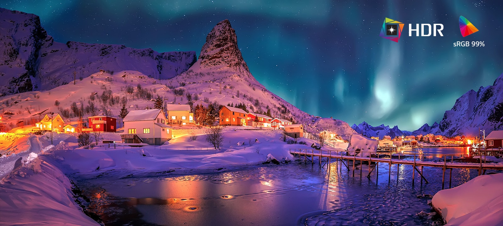 Split-screen comparison showing SDR versus HDR10 Pro with sRGB 99% color gamut, highlighting brighter highlights, deeper shadows, and more vivid color detail in a snowy village night landscape.