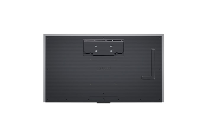 An LG OLED evo M4 mounted on a marbled wall of a bright, modern living room. A Zero Connect Box on a table behind other furniture, and a red Wi-Fi signal and red beam emitting towards the TV. The words "location FREE" in the bottom left corner.