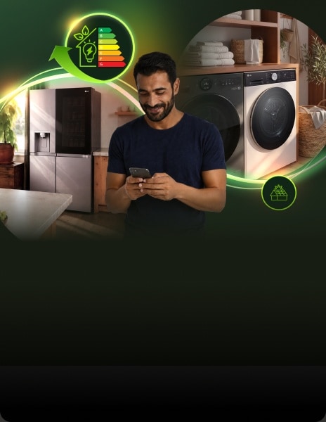 Uomo che usa uno smartphone in una moderna lavanderia con lavatrice, asciugatrice e frigorifero LG, circondato da grafiche luminose sull'efficienza energetica.