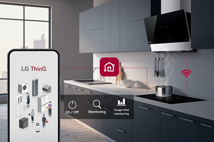 Cucina moderna con cappa aspirante accesa, pentola fumante sul fornello e smartphone che mostra l'app LG ThinQ.