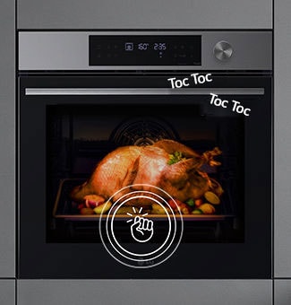  Un'icona di una mano che bussa sulla porta del forno, con la luce accesa al suo interno.