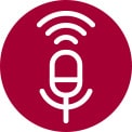 Un microfono bianco con onde sonore su sfondo rosso, indicante la funzione di registrazione audio.