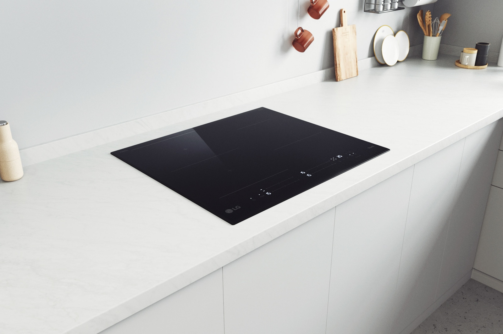 Immagine ambientata del piano cottura a induzione installato in una cucina bianca.