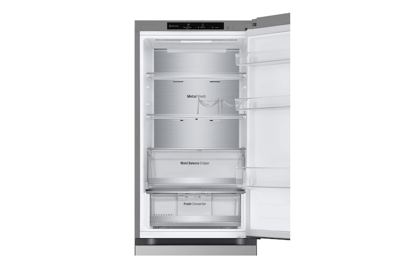 Dettaglio della parte superiore del frigorifero con porta aperta