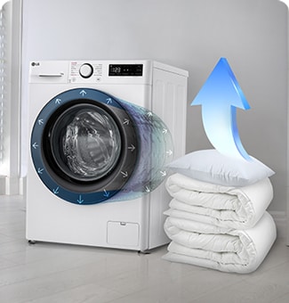  Lavatrice LG a carica frontale, con coperte bianche piegate accanto e freccia blu che indica il flusso d'aria verso l'alto.