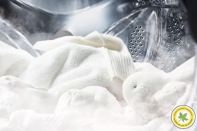 Esta es una imagen de agua saliendo de la lavadora en 5 direcciones.