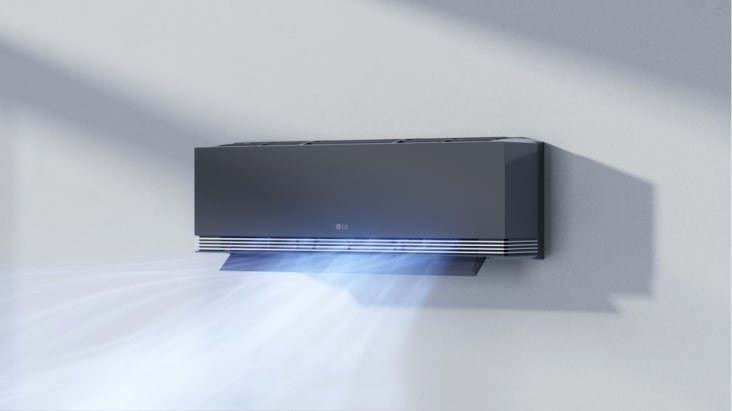 LG airconditioner die zachte, lichte luchtstroom levert in een moderne woonkamer voor een comfortabele omgeving.