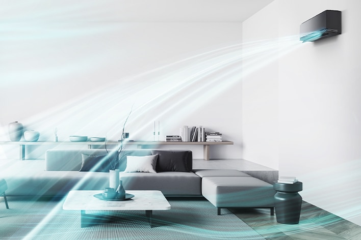 Stijlvolle woonkamer met LG airconditioner die dual vane-technologie gebruikt om de luchtstroom sneller door de ruimte te verspreiden.