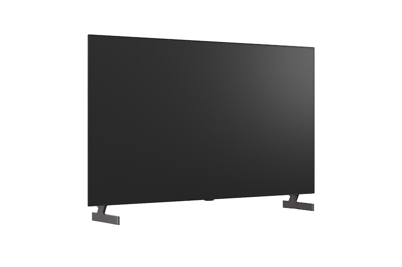 超薄型デザインと極細ベゼルを備えたLG OLED AI B6が、スタイリッシュなリビング空間に壁掛けで設置されている。画面には虹色のトーンで彩られた風景と、層をなす山々の造形が映し出されている。