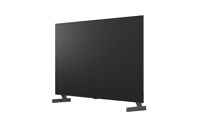 超薄型デザインと極細ベゼルを備えたLG OLED AI B6が、スタイリッシュなリビング空間に壁掛けで設置されている。画面には虹色のトーンで彩られた風景と、層をなす山々の造形が映し出されている。