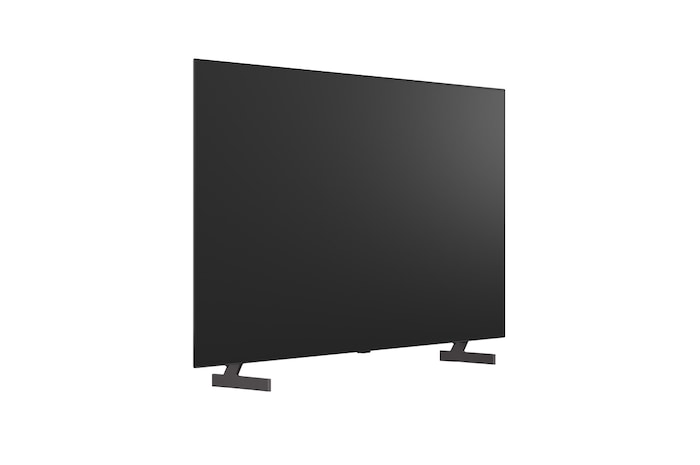 超薄型デザインと極細ベゼルを備えたLG OLED AI B6が、スタイリッシュなリビング空間に壁掛けで設置されている。画面には虹色のトーンで彩られた風景と、層をなす山々の造形が映し出されている。
