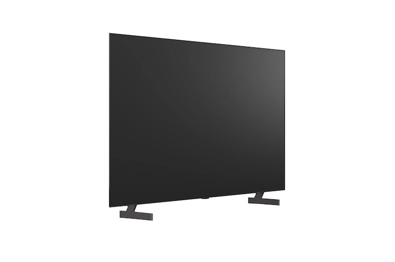 超薄型デザインと極細ベゼルを備えたLG OLED AI B6が、スタイリッシュなリビング空間に壁掛けで設置されている。画面には虹色のトーンで彩られた風景と、層をなす山々の造形が映し出されている。