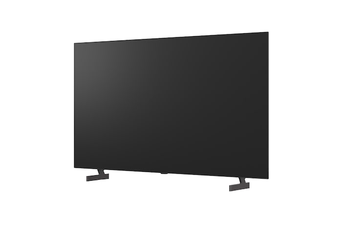 超薄型デザインと極細ベゼルを備えたLG OLED AI B6が、スタイリッシュなリビング空間に壁掛けで設置されている。画面には虹色のトーンで彩られた風景と、層をなす山々の造形が映し出されている。