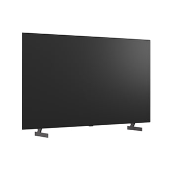 超薄型デザインと極細ベゼルを備えたLG OLED AI B6が、スタイリッシュなリビング空間に壁掛けで設置されている。画面には虹色のトーンで彩られた風景と、層をなす山々の造形が映し出されている。