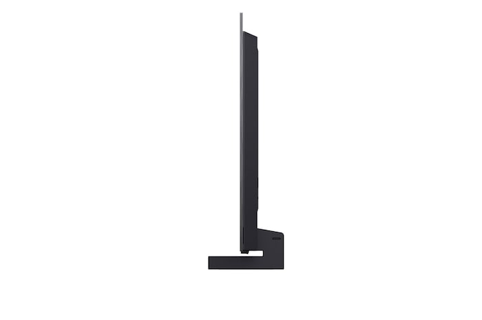 LG OLED evo AI C6 is wall-mounted in a styled living space, featuring an ultra-slim design with narrow bezels, and it displays a riverside cityscape at sunset on screen.