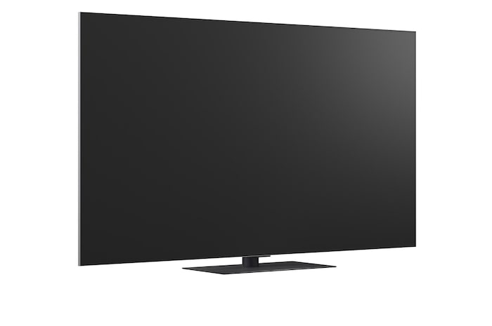 LG OLED evo AI G6 displays a vivid ocean sunset scene, with a soundbar and speaker positioned below the screen, enhancing a calm and atmospheric living space.