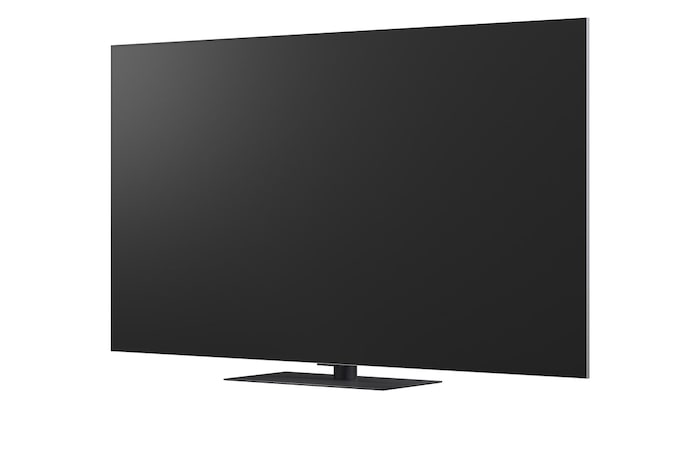 LG OLED evo AI G6 displays a vivid ocean sunset scene, with a soundbar and speaker positioned below the screen, enhancing a calm and atmospheric living space.