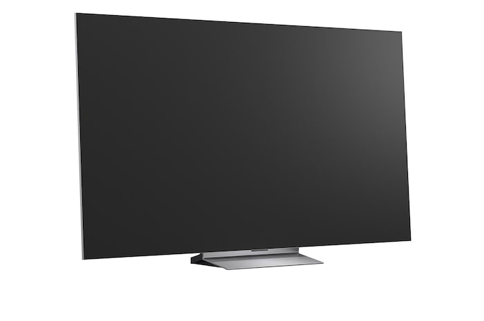 LG OLED evo AI G6 displays a vivid ocean sunset scene, with a soundbar and speaker positioned below the screen, enhancing a calm and atmospheric living space.