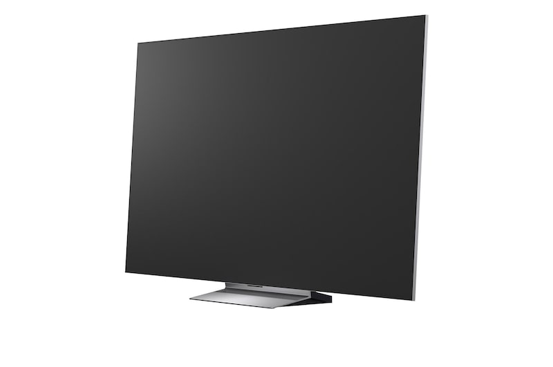LG OLED evo AI G6 displays a vivid ocean sunset scene, with a soundbar and speaker positioned below the screen, enhancing a calm and atmospheric living space.