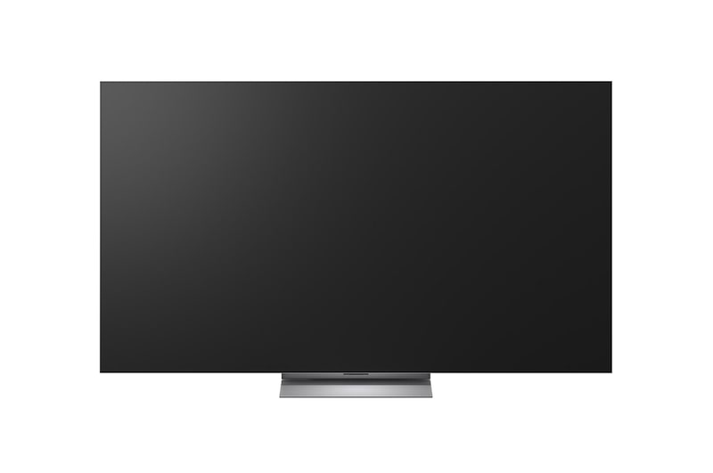 LG OLED evo AI G6, shown from the side, highlights its Flush Fit Gallery Design with a zero-gap wall-mounted installation, displaying a night scene of a lit bridge with reflections on water.