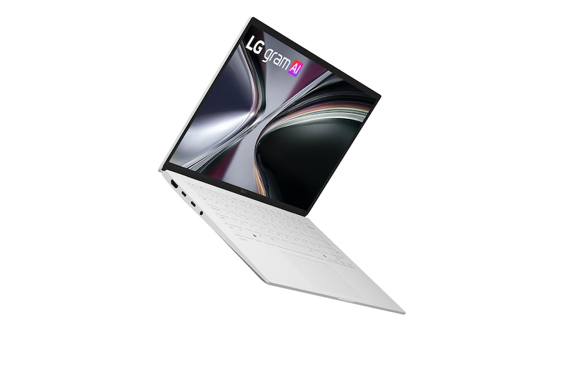 A top-down view of an LG gram laptop surrounded by circular sound wave graphics. The image visually represents immersive spatial audio, with Dolby Atmos branding shown on the lower corner of the scene.