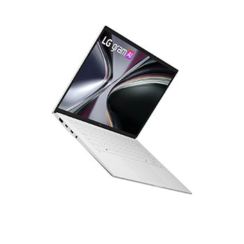 A top-down view of an LG gram laptop surrounded by circular sound wave graphics. The image visually represents immersive spatial audio, with Dolby Atmos branding shown on the lower corner of the scene.