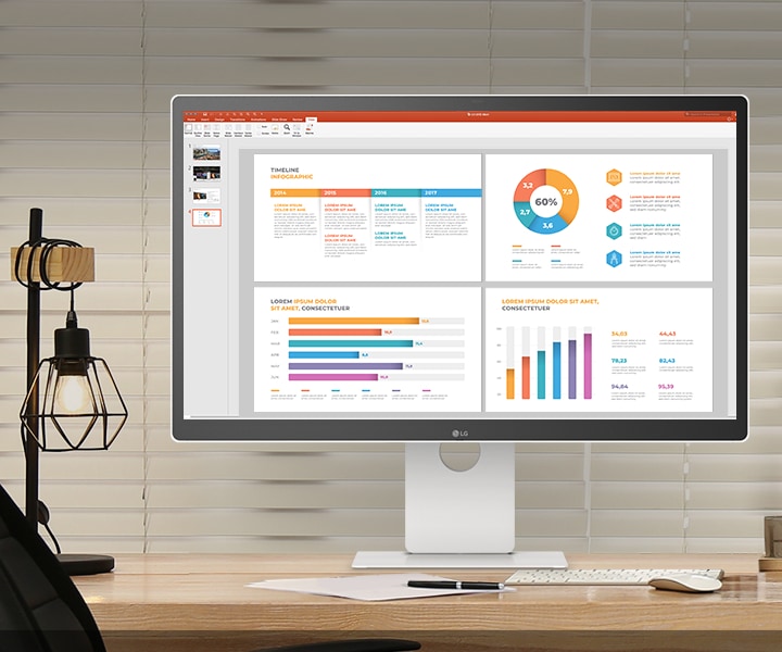 デスクにLG Smart Monitorが設置されている。まず、画面にPPTドキュメントが表示され、次の瞬間には映画の一シーンが映し出される。モニターの周りには紙、ペン、キーボード、マウスがある。