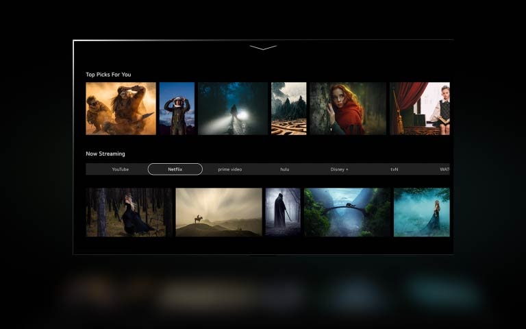 webOS 23 New Home UX の画面の画像として適合するよう、SF 映画の場面がリサイズされます。下にスクロールした後のホーム画面には、パーソナライズされたおすすめや人気のコンテンツが表示されます。