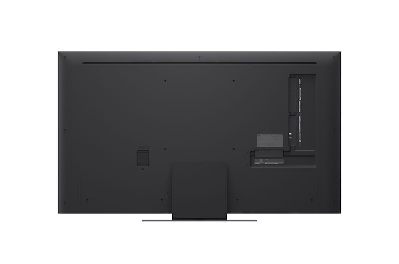 Экран телевизора LG TV с AI Magic Remote на переднем плане. Выделена кнопка «ИИ», а в облачке представлен текст: «Предложи фильм, который мне понравится». На экране мы видим иконку пользователя E, что указывает на то, что ИИ-функция Voice ID смогла распознать пользователя по голосу и предоставить ему персонализированные рекомендации.