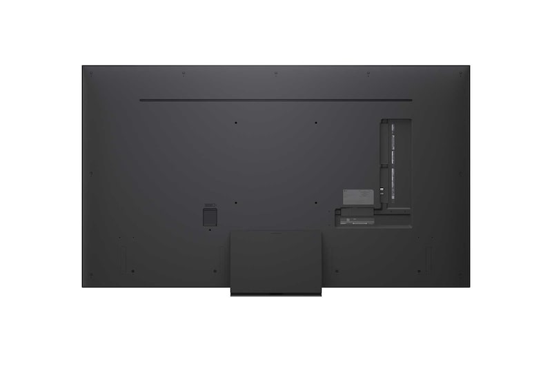 Экран телевизора LG TV с AI Magic Remote на переднем плане. Выделена кнопка «ИИ», а в облачке представлен текст: «Предложи фильм, который мне понравится». На экране мы видим иконку пользователя E, что указывает на то, что ИИ-функция Voice ID смогла распознать пользователя по голосу и предоставить ему персонализированные рекомендации.