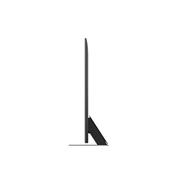 Девушка и собака сидят перед телевизором LG QNED TV, установленным на стене, на экране которого изображены три слона, идущих наружу, над панелью LG Soundbar. Заголовок рассказывает о том, как каждое действие становится более захватывающим на огромном экране.
