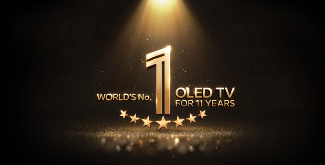 Золотая эмблема телевизора OLED «№ 1 в мире в течение 11 лет» на черном фоне. Прожектор освещает эмблему, а пространство заполняют золотые абстрактные звезды.
