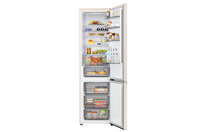 LG bottom freezer (GC-B509EETM) installed flush in tall warm beige wall with white arrows pointing to top side and front surfaces