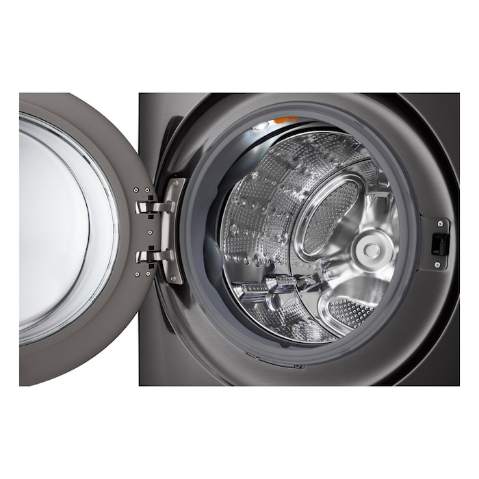 A woman checking a bill with a 55% energy-saving arrow icon and LG washer dryer combo