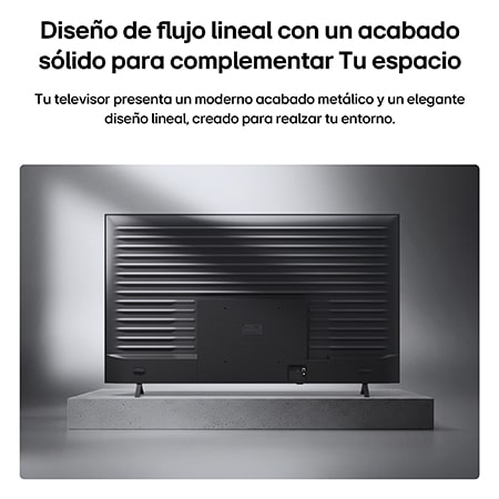 LG QNED evo AI QNED85 Mini LED with a Slim Design is wall-mounted in a bright, open living space, featuring a sleek profile that blends seamlessly into the interior while displaying a bold, colorful abstract artwork.