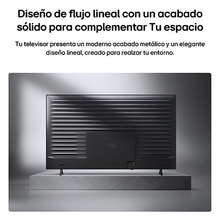 LG QNED evo AI QNED85 Mini LED with a Slim Design is wall-mounted in a bright, open living space, featuring a sleek profile that blends seamlessly into the interior while displaying a bold, colorful abstract artwork.