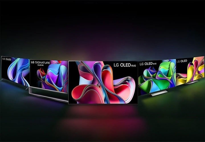 Una línea de varios televisores OLED de LG, incluidos los modelos LG SIGNATURE OLED 8K, LG OLED evo y LG OLED que muestran diseños abstractos vibrantes y coloridos en sus pantallas, sobre un fondo oscuro.